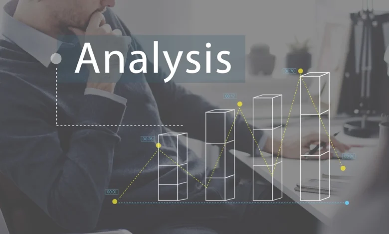 Business professional analyzing bar chart data with digital overlay, representing AI-driven data analysis and business intelligence
